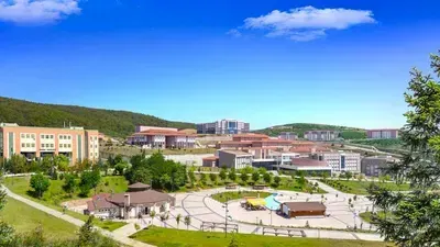 شعار جامعة دوزجة